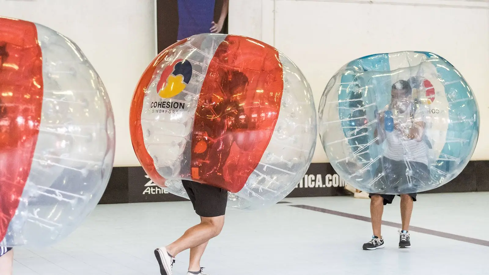 Bubble Soccer participants during a playful Cohesion team building session