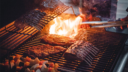 BBQ food being prepared for an event