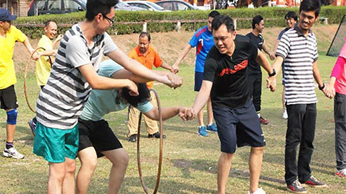 Telematch participants working through a team challenge
